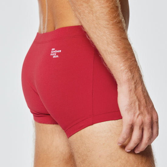 EIN SCHÖNER FLECK ERDE. Herrenunterhose zum Wandern. Unterwäsche zum Bergsteigen. Unterhose mit Bergmotiv WILDER MANN. Kurze Lieferwege. Original.