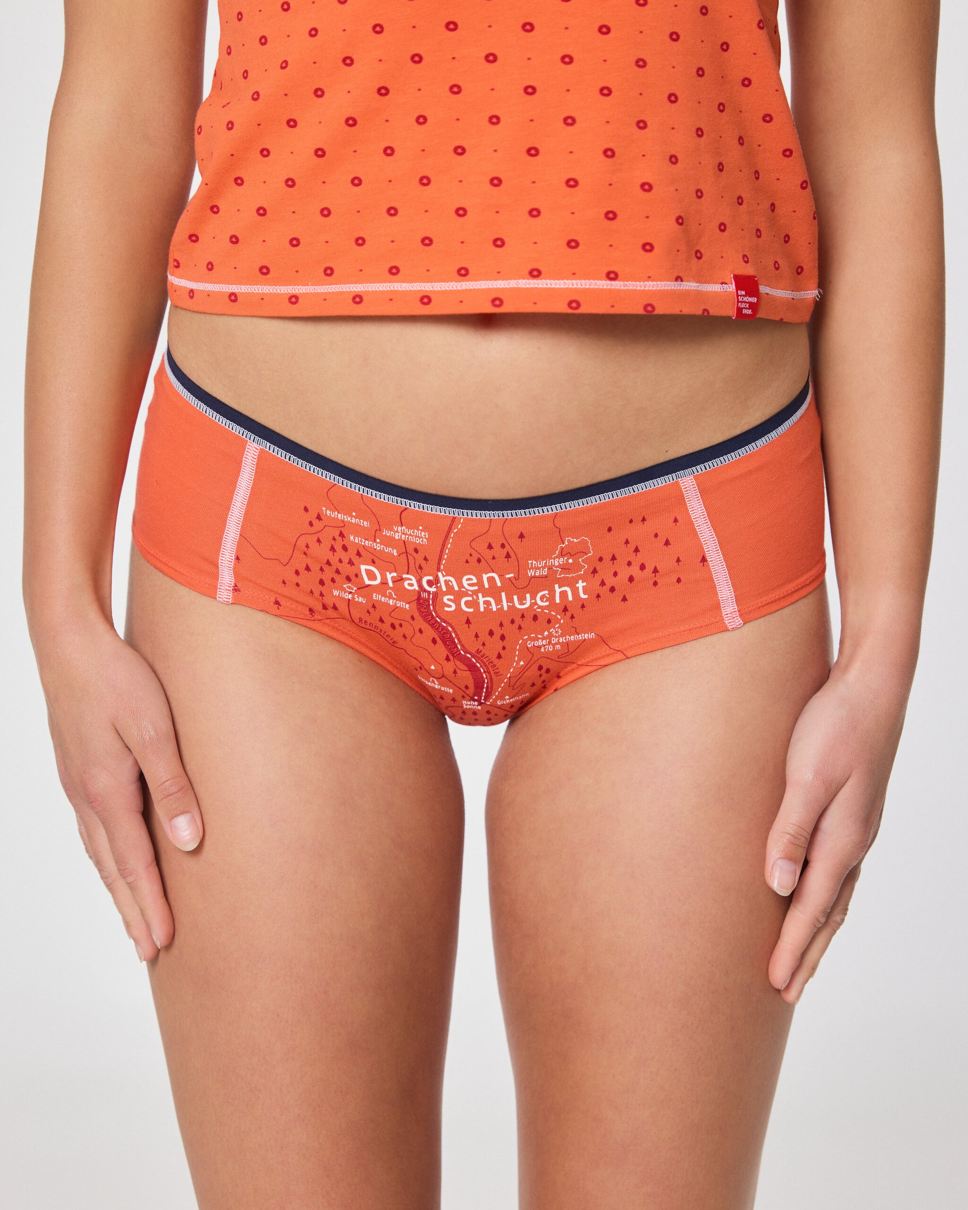 Damen-Hipster Unterhose in Orange mit Aufdruck ‚Drachenschlucht‘ und dezentem Muster