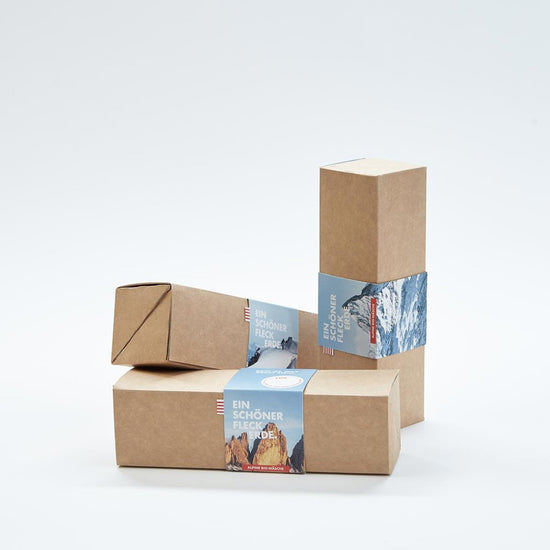 EIN SCHÖNER FLECK ERDE. Verpackung aus Papier. Box zum Verschenken. Nachhaltige Verpackung.