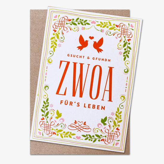 Grußkarte Zwoa für’s Leben mit floraler Verzierung und roten Vögeln